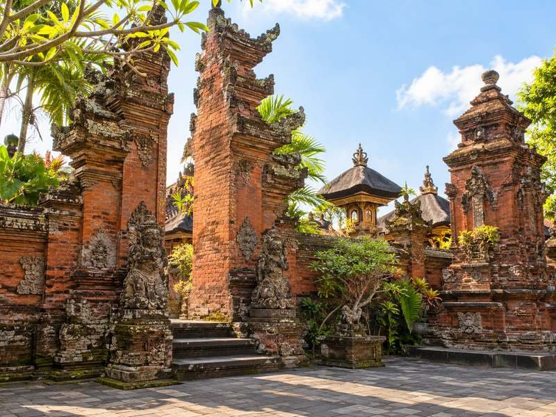 Historic red brick temple architecture at Pura Maospahit in Denpasar Bali